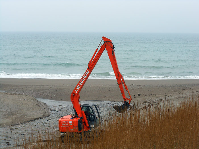Construction of sea defences (rock armour) on the South Devon coastline