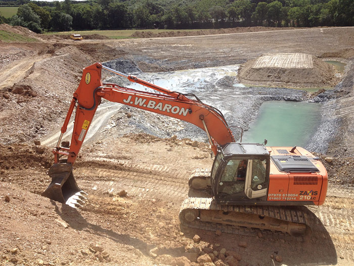 Forest road created after clearing scrub and trees