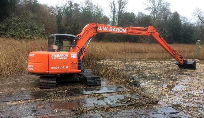 Weed removal from a lake in Devon